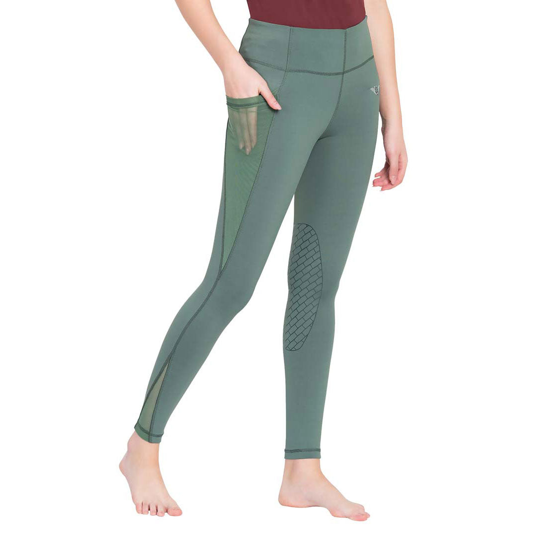 Green leggings with textured design on a white background