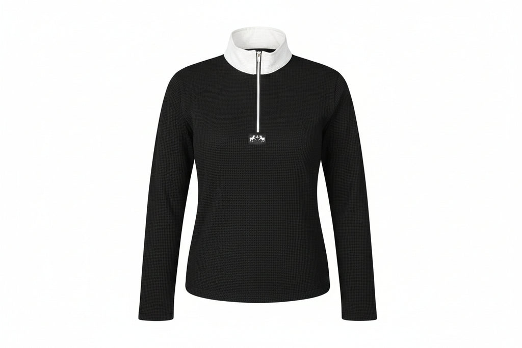 Person wearing a black long-sleeve shirt with a white collar and zipper, standing against a white background.