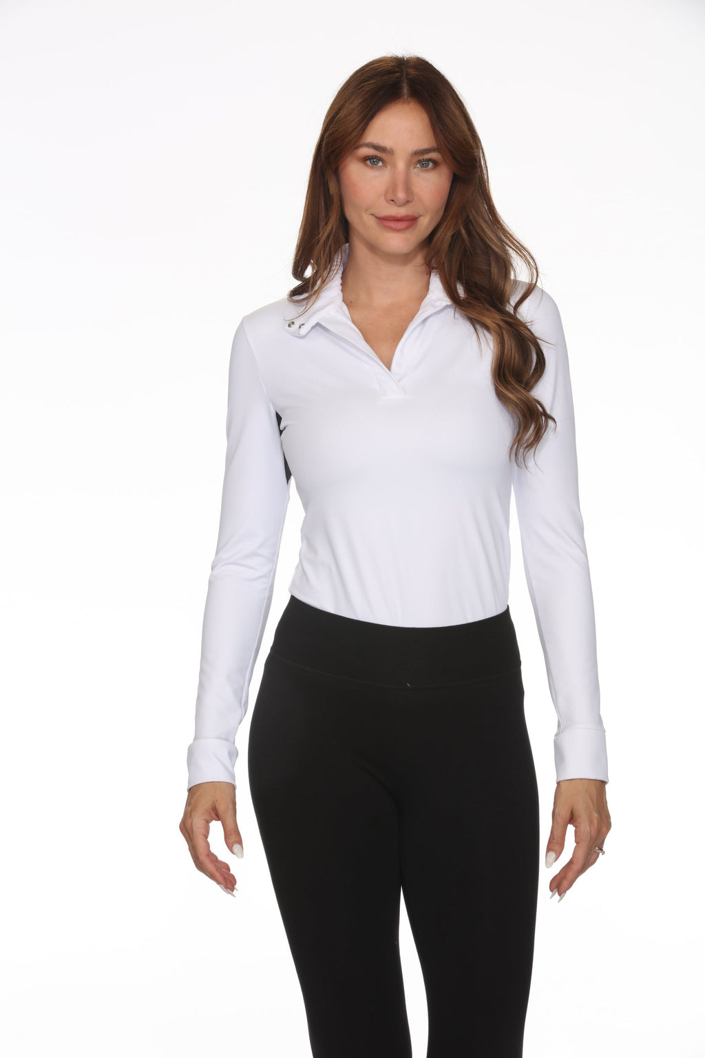 Woman wearing a white long-sleeve shirt and black leggings on a white background