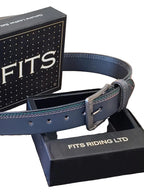 Blue leather belt with silver buckle in a 'FITS RIDING LTD' box on a wooden surface.