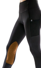 Black riding pants with tan brown patch on a white background