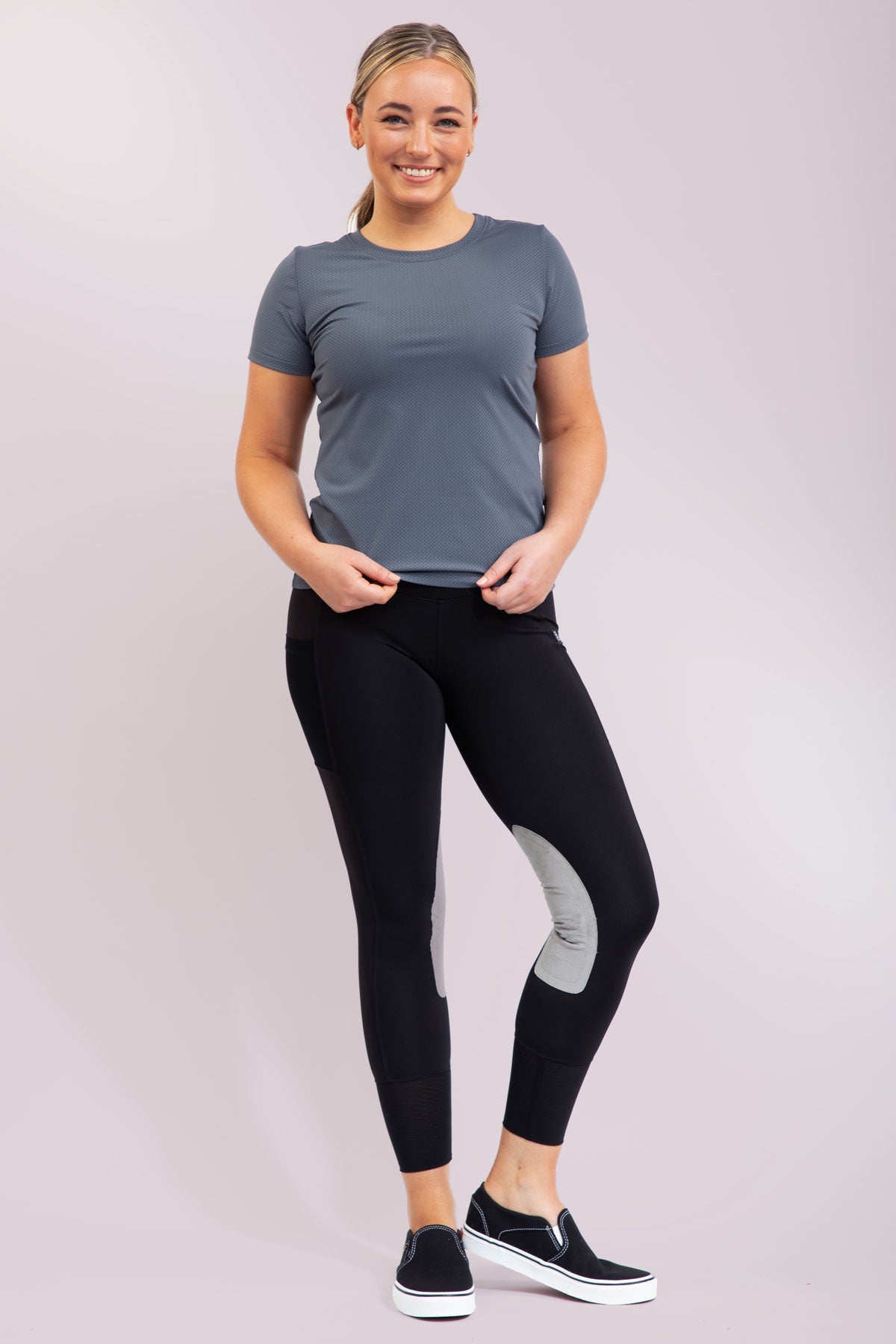 black riding breeches with light grey knee details