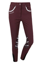 Maroon riding pants with white accents on a white background