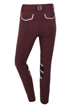 Maroon riding pants with white accents on a white background