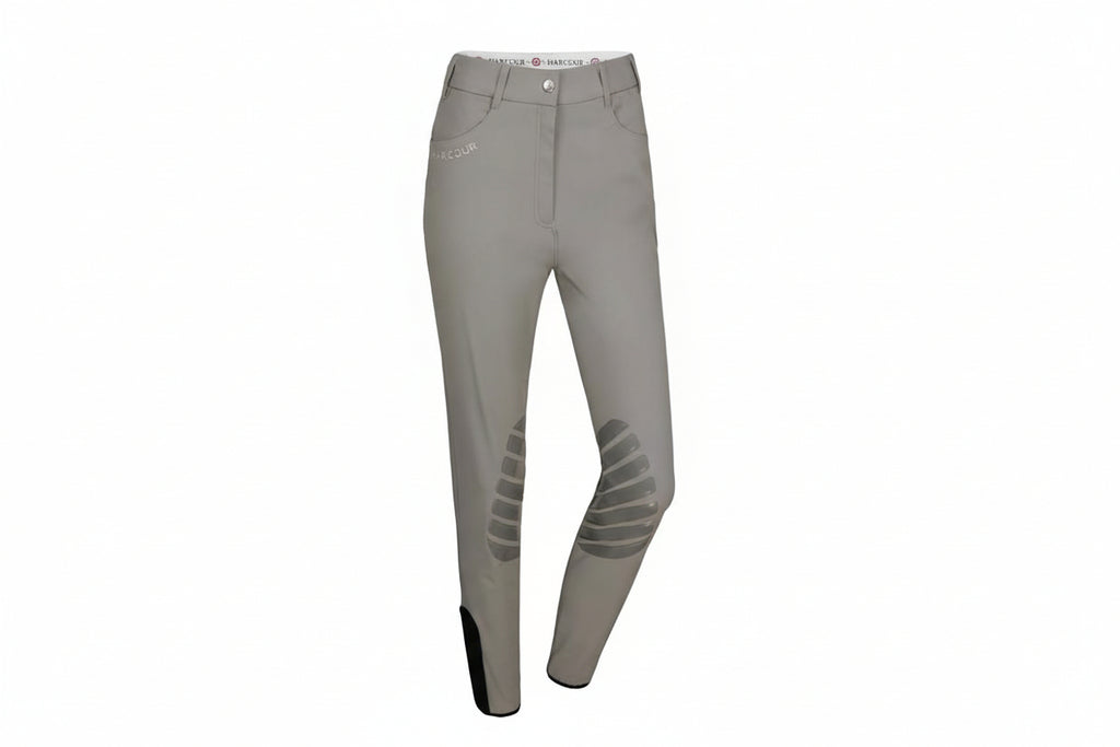 Gray riding pants with knee patches on a white background