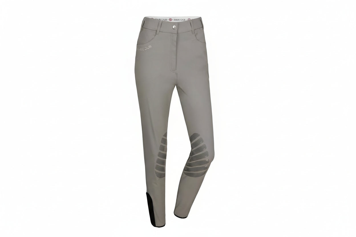 Gray riding pants with knee patches on a white background