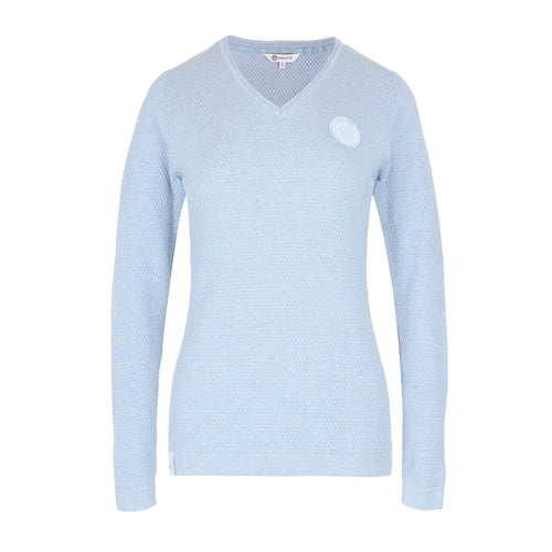 Light blue sweater with a small white logo on a white background